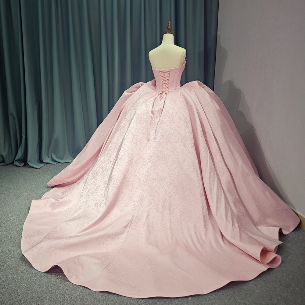 
                      
                        Pink Strapless Satin Quinceanera Dress
                      
                    