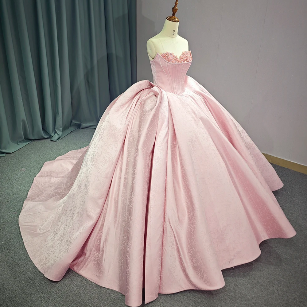 
                      
                        Pink Strapless Satin Quinceanera Dress
                      
                    