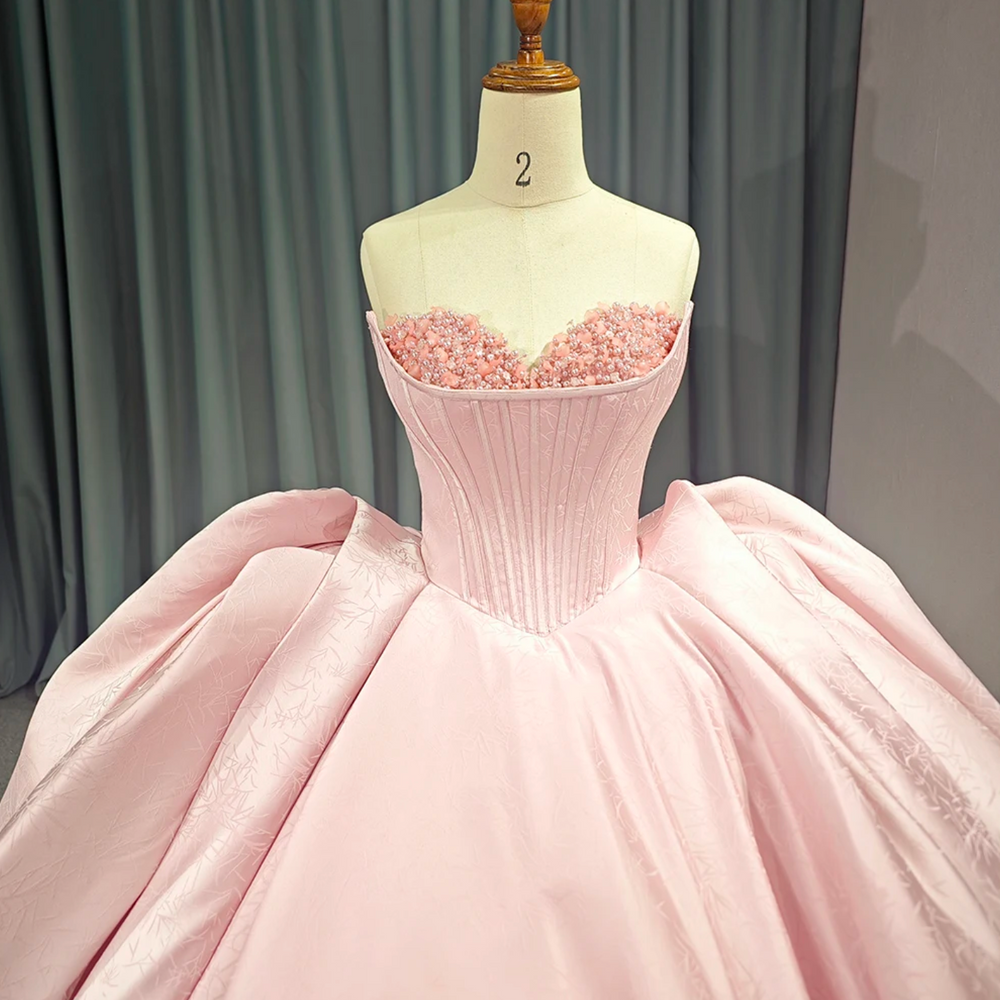 
                      
                        Pink Strapless Satin Quinceanera Dress
                      
                    