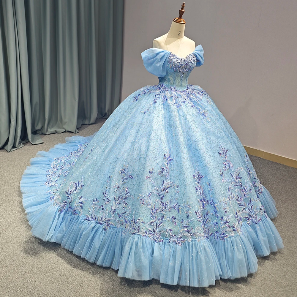 
                      
                        Blue V-neck Tulle Tiered Puff Sleeves Ball Gown Quinceanera Dress
                      
                    