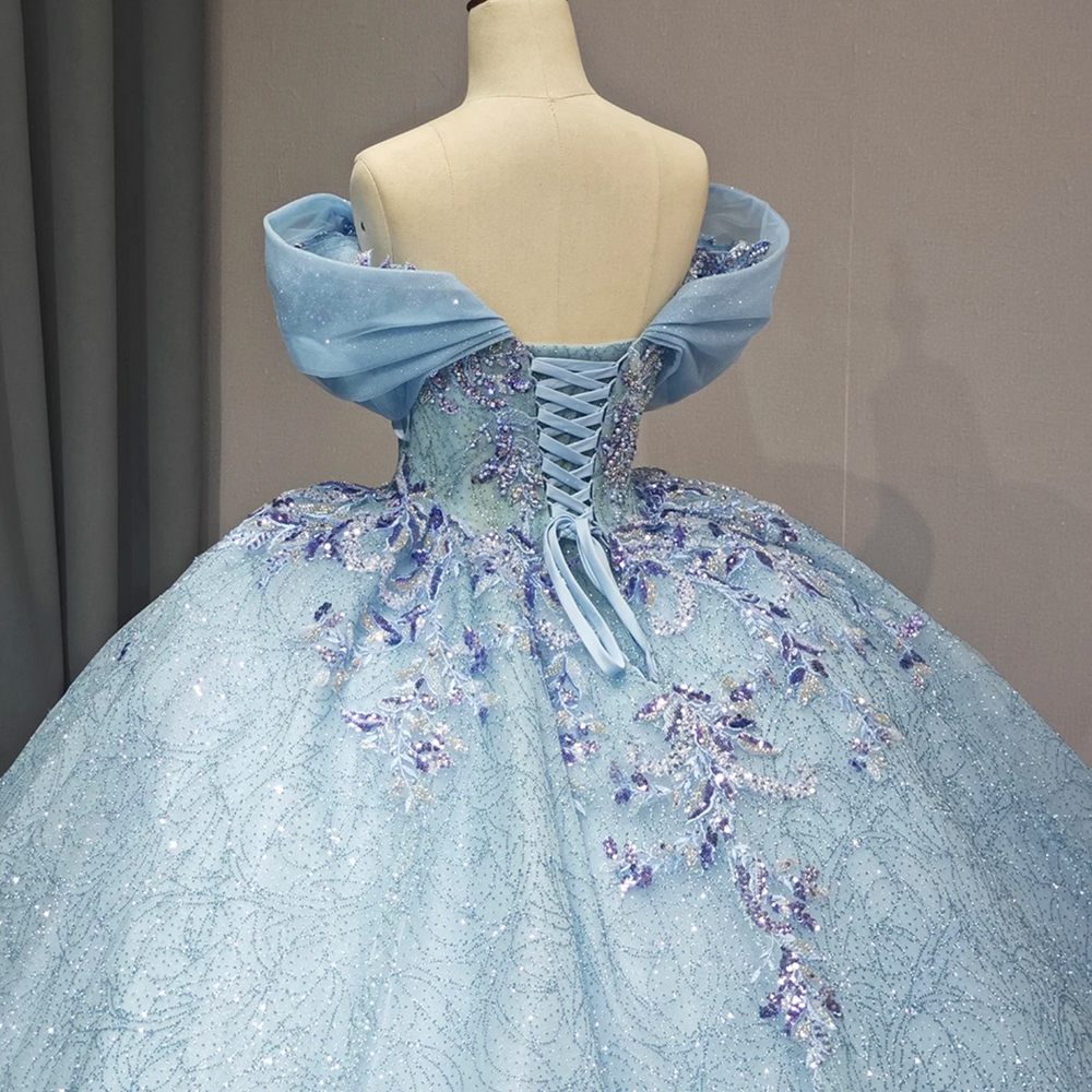 
                      
                        Blue V-neck Tulle Tiered Puff Sleeves Ball Gown Quinceanera Dress
                      
                    