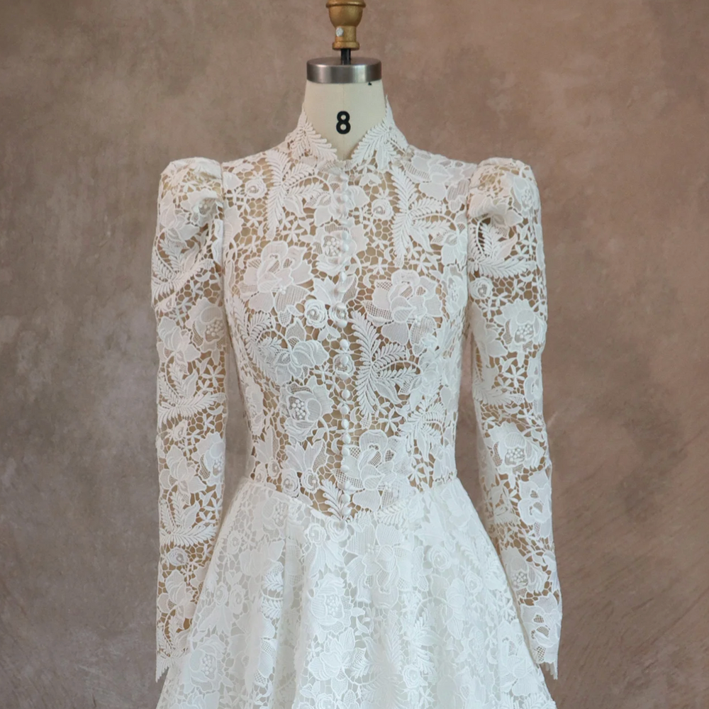 
                      
                        Romantic Lace High Neck Wedding Dress With Long Sleeves
                      
                    