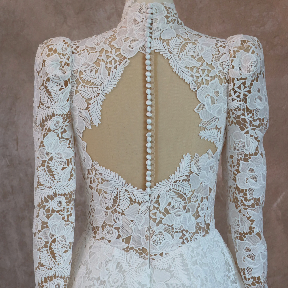 
                      
                        Romantic Lace High Neck Wedding Dress With Long Sleeves
                      
                    