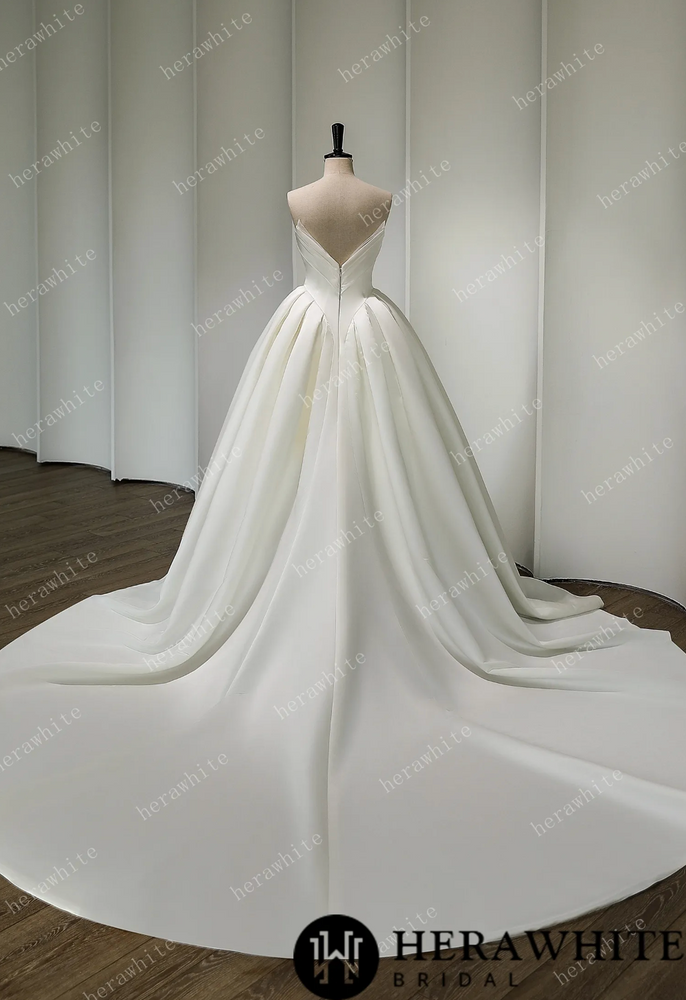 
                      
                        Luxurious Strapless Silk Ball gown Wedding Dress
                      
                    