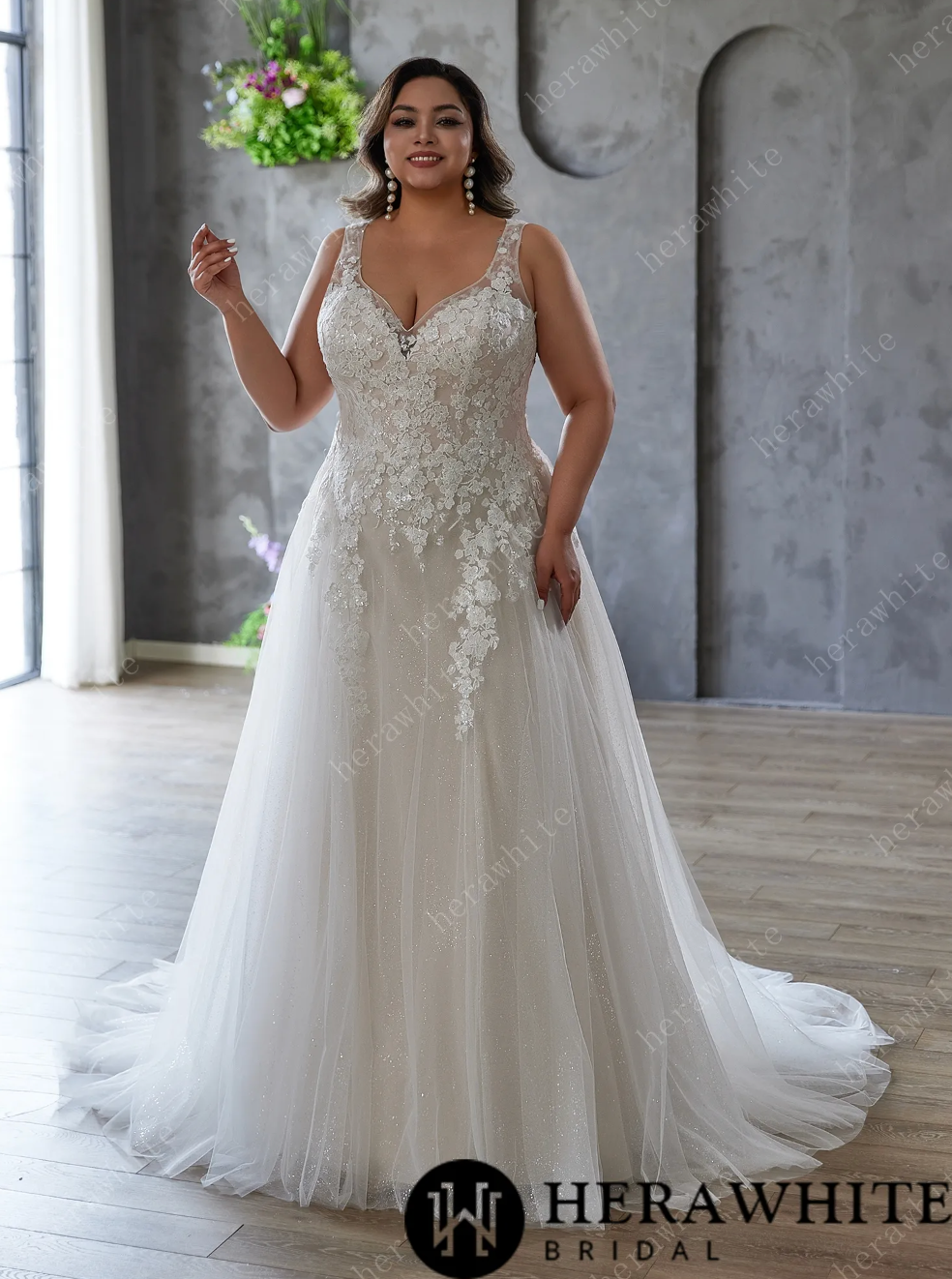 Elegant and Ethereal Plus-Size Wedding Dress with Lace and Sequins