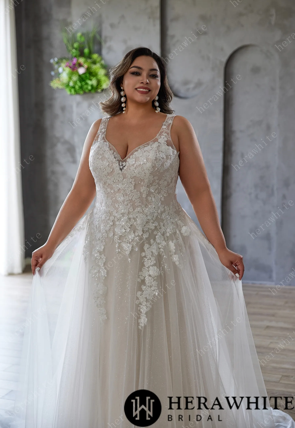 Elegant and Ethereal Plus-Size Wedding Dress with Lace and Sequins