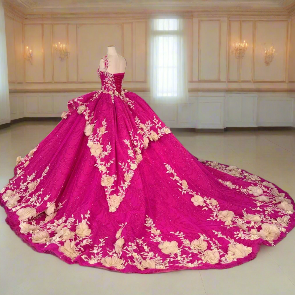 
                      
                        Pink gown with floral embroidery on a mannequin
                      
                    