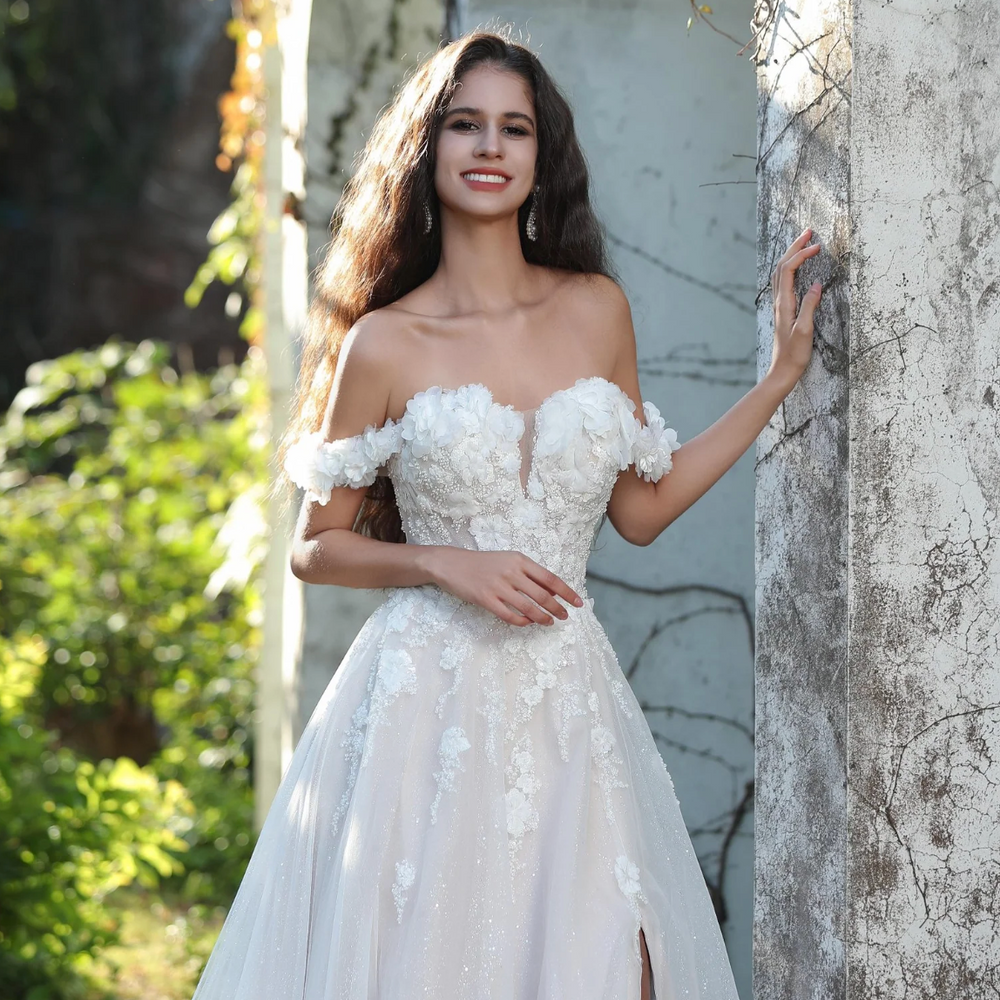 
                      
                        Elegant Floral Off-The-Shoulder A-Line Wedding Gown
                      
                    
