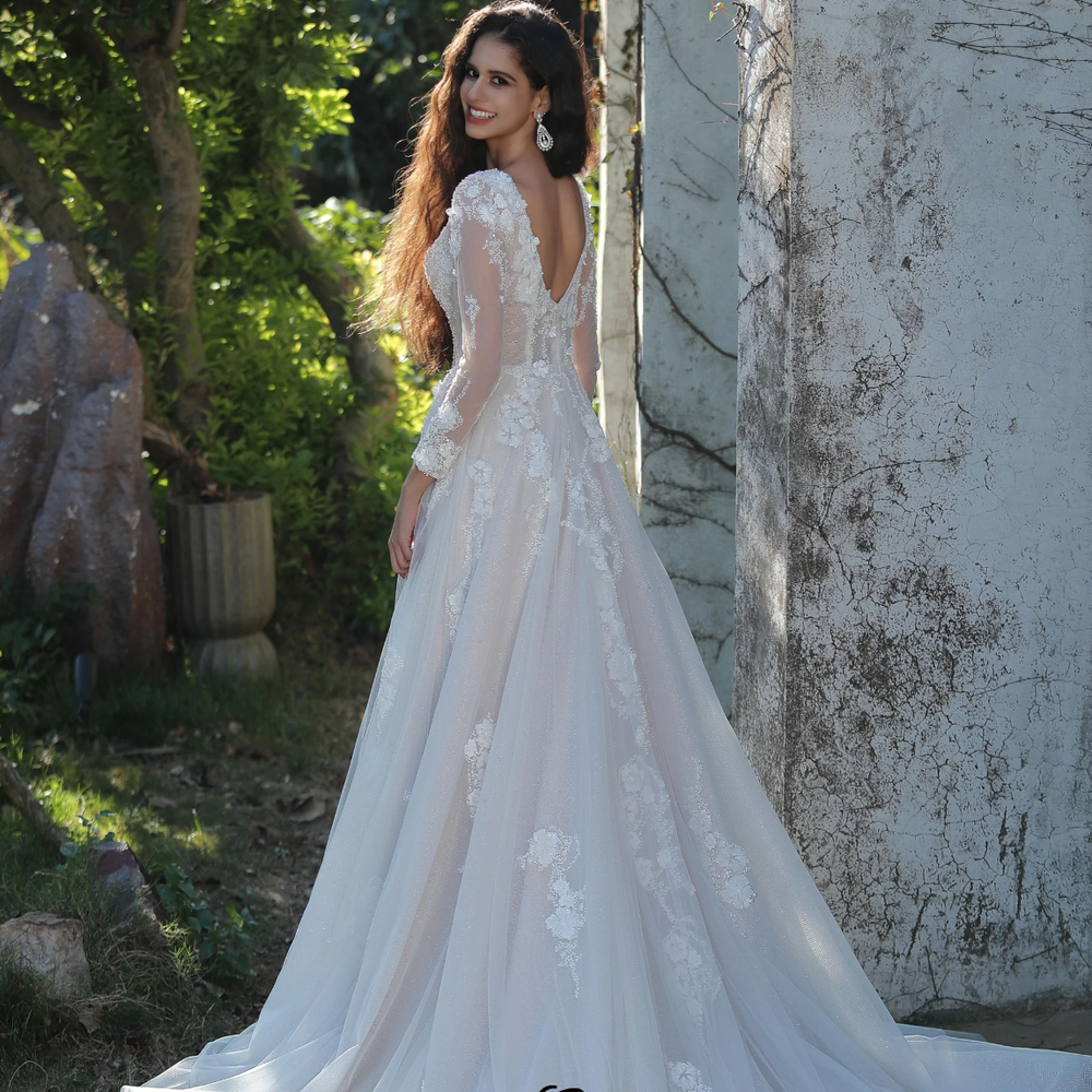 
                      
                        Ethereal Long-Sleeved A-Line Wedding Gown With Intricate Floral Embroidery
                      
                    