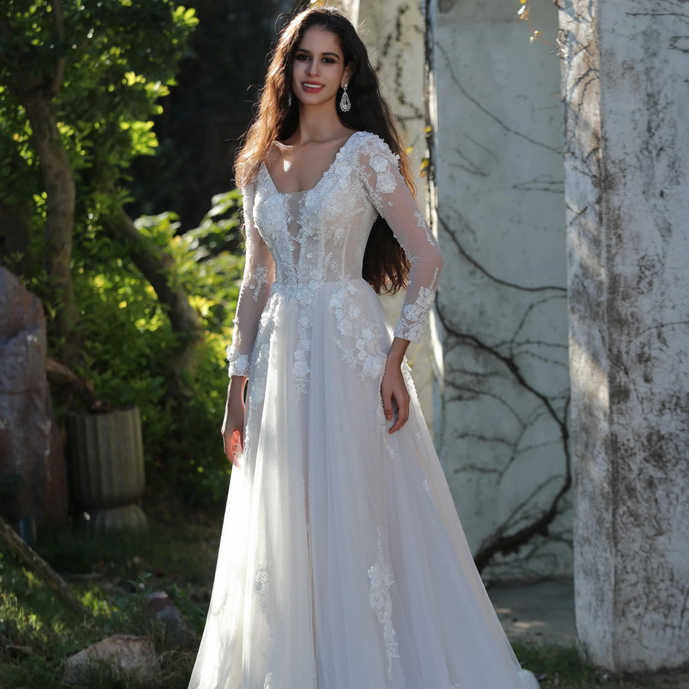 
                      
                        Ethereal Long-Sleeved A-Line Wedding Gown With Intricate Floral Embroidery
                      
                    