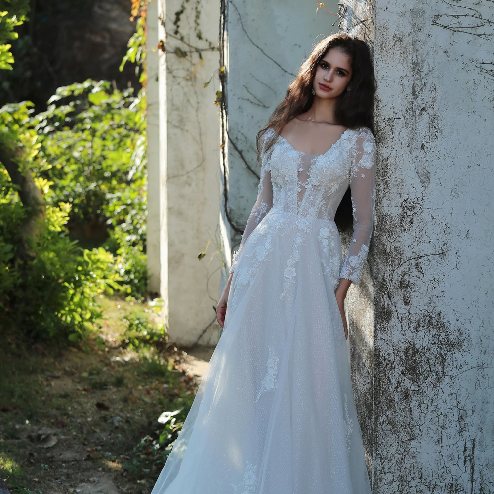
                      
                        Ethereal Long-Sleeved A-Line Wedding Gown With Intricate Floral Embroidery
                      
                    