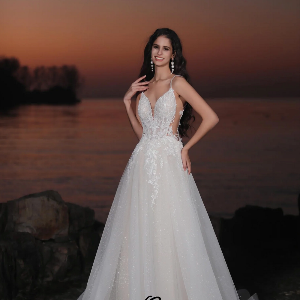
                      
                        Glamorous Spaghetti Straps Tulle A-Line Wedding Dress
                      
                    