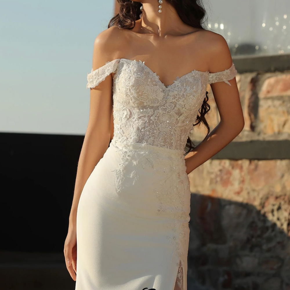 
                      
                        Elegant Off-the-shoulder Sheath Crepe Wedding dress
                      
                    