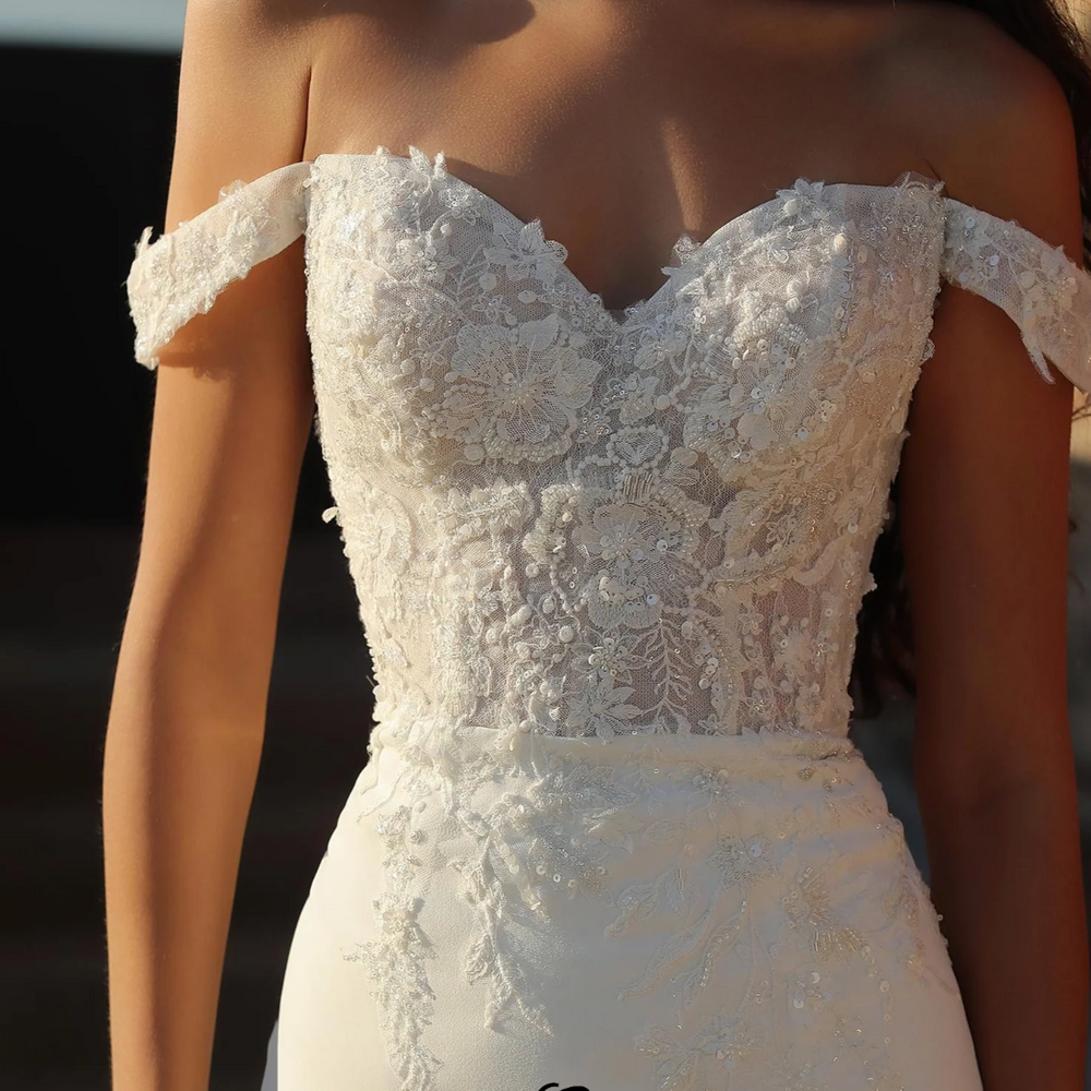 
                      
                        Elegant Off-the-shoulder Sheath Crepe Wedding dress
                      
                    
