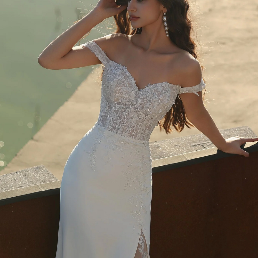 
                      
                        Elegant Off-the-shoulder Sheath Crepe Wedding dress
                      
                    