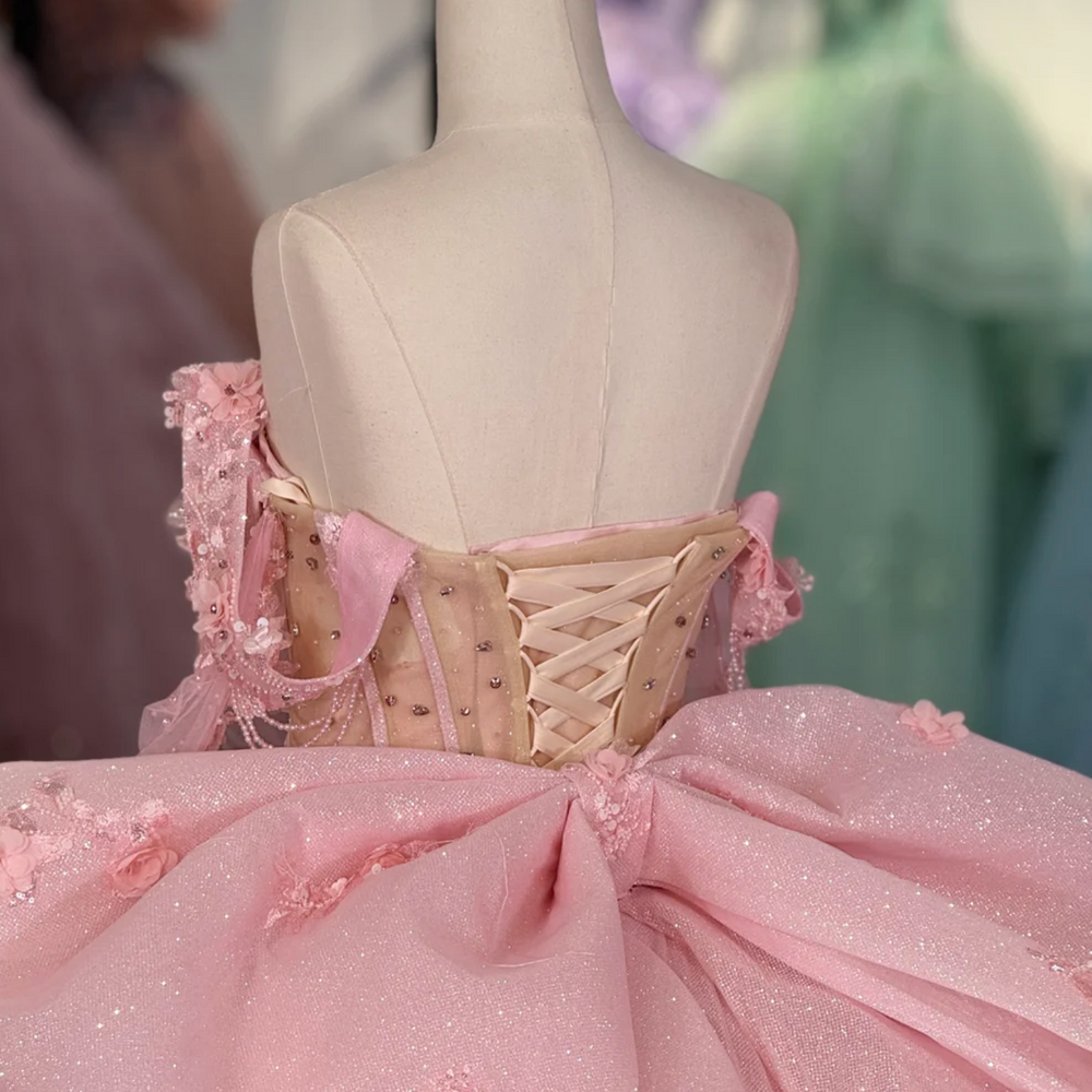 
                      
                        Quinceanera Dress Pink Glitter Party Ball Gown, this Pink Beaded Ball Gown Quinceanera Dress is a dazzling choice for a special celebration. Crafted from shimmering glitter organza
                      
                    