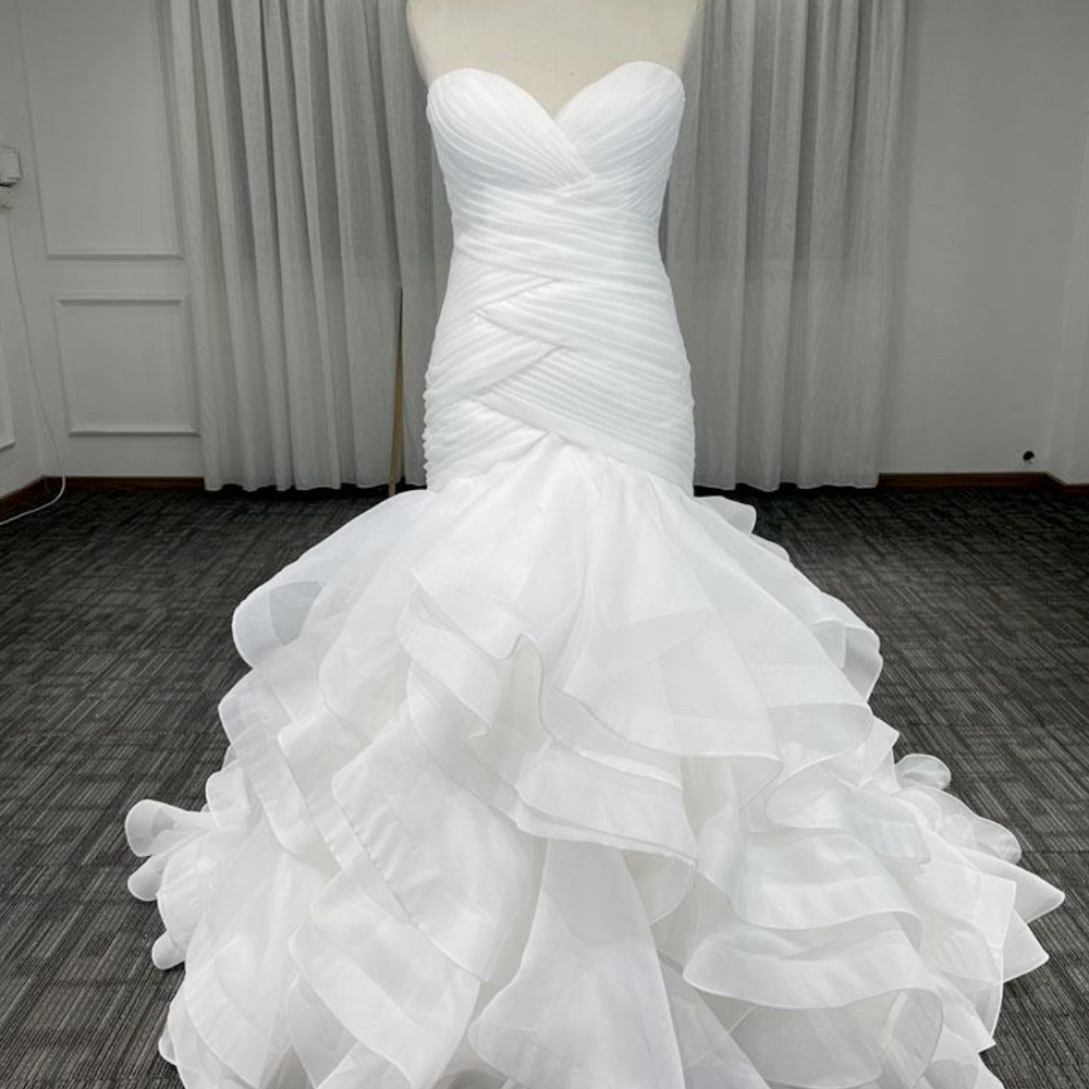 
                      
                        Sleeveless Satin Sweetheart Criss Cross Ruffle Wedding Dress
                      
                    