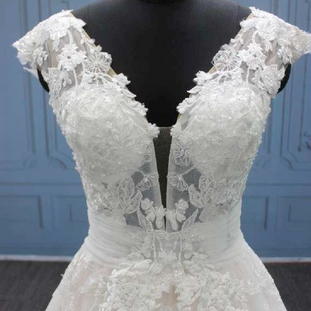 
                      
                        Cut Out Back A Line Beaded Lace Bridal Gown
                      
                    