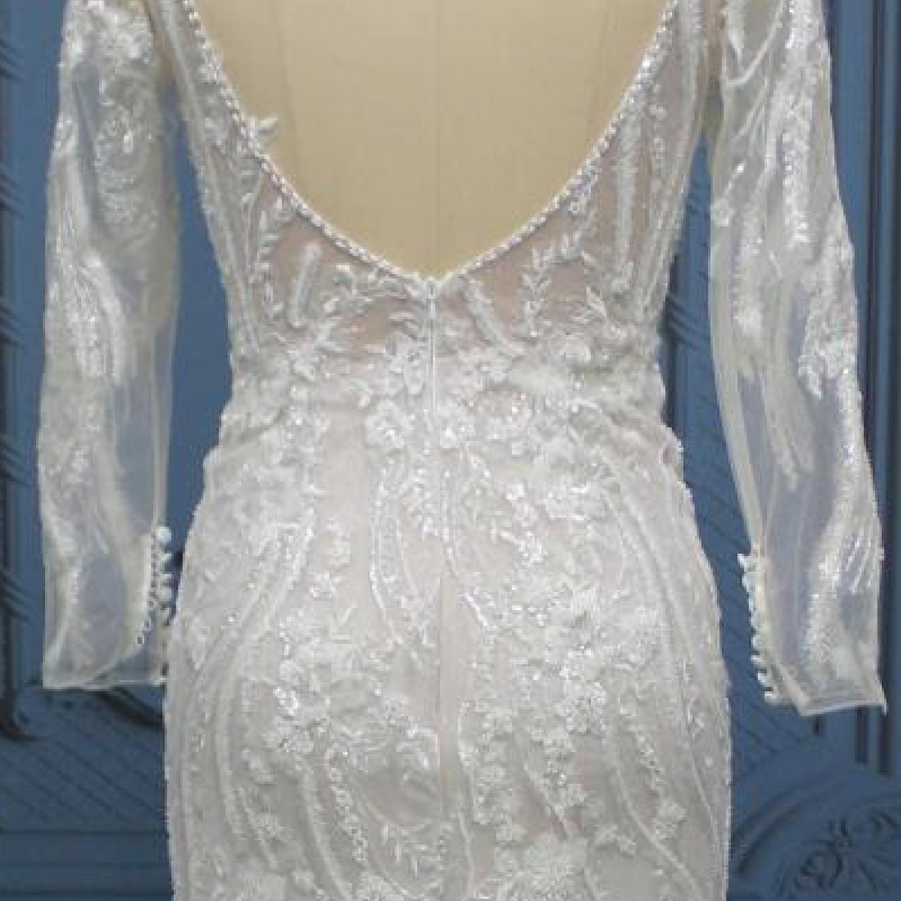 
                      
                        Beaded Lace Illusion Sleeve Deep Plunging V Neckline Tulle Bridal Wedding Gown
                      
                    