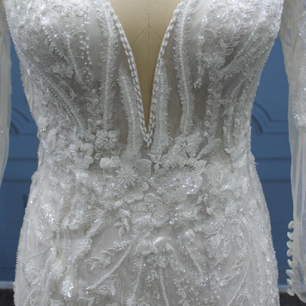 
                      
                        Beaded Lace Illusion Sleeve Deep Plunging V Neckline Tulle Bridal Wedding Gown
                      
                    