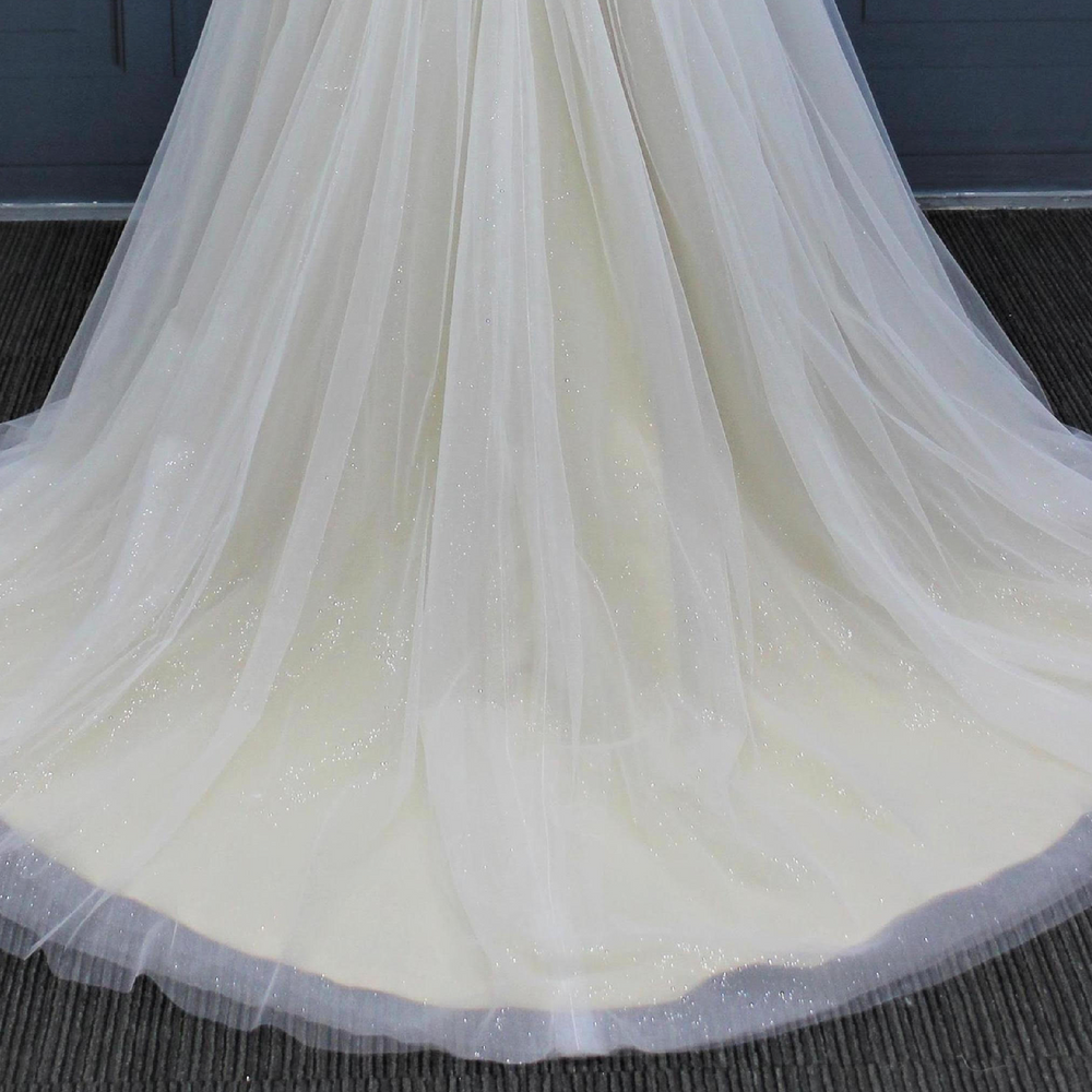 
                      
                        Glitter Tulle A Line Sleeveless Beaded Spaghetti Strap Wedding Gown
                      
                    