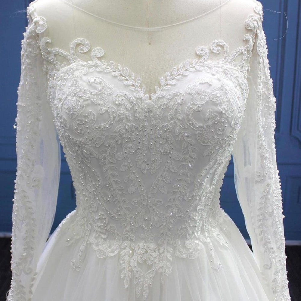 
                      
                        Long Sleeve Illusion Lace Tulle Pearl Bead A Line Wedding Dress
                      
                    