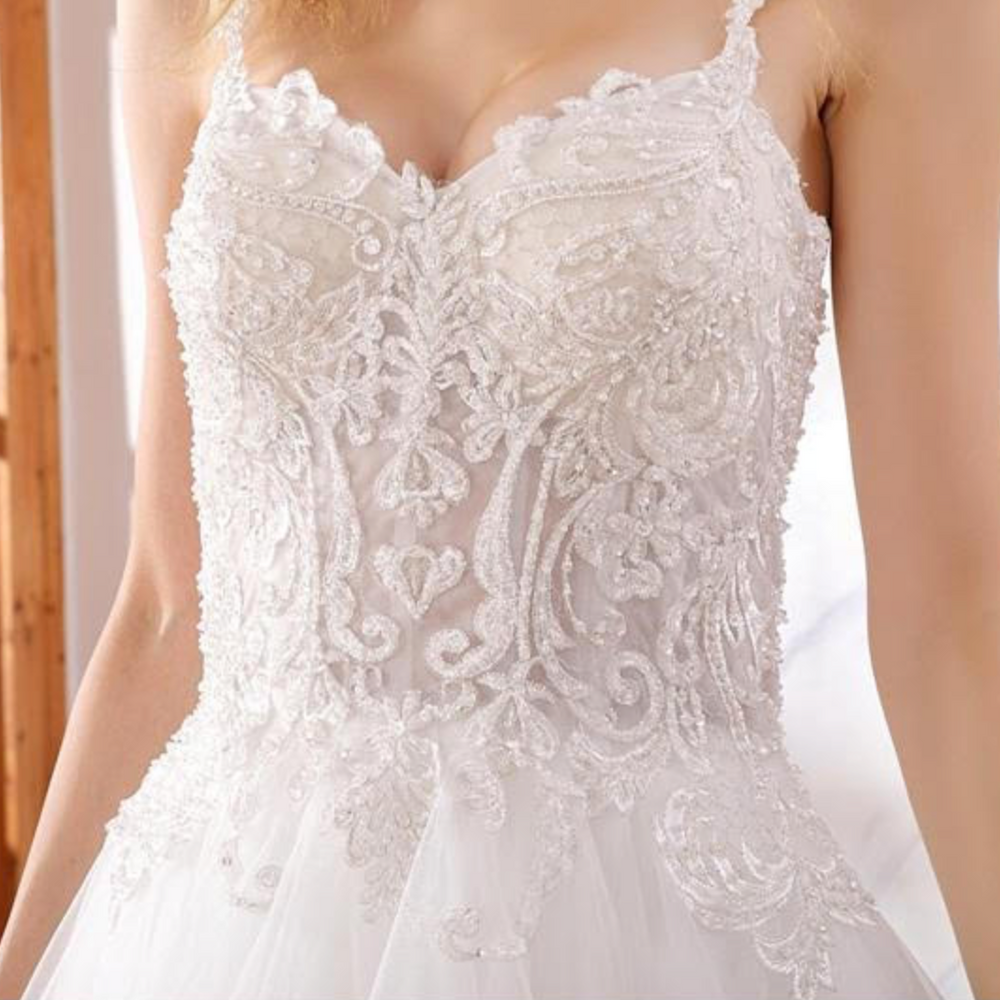 
                      
                        Ruffled Beaded Luxury A Line Wedding Gown
                      
                    