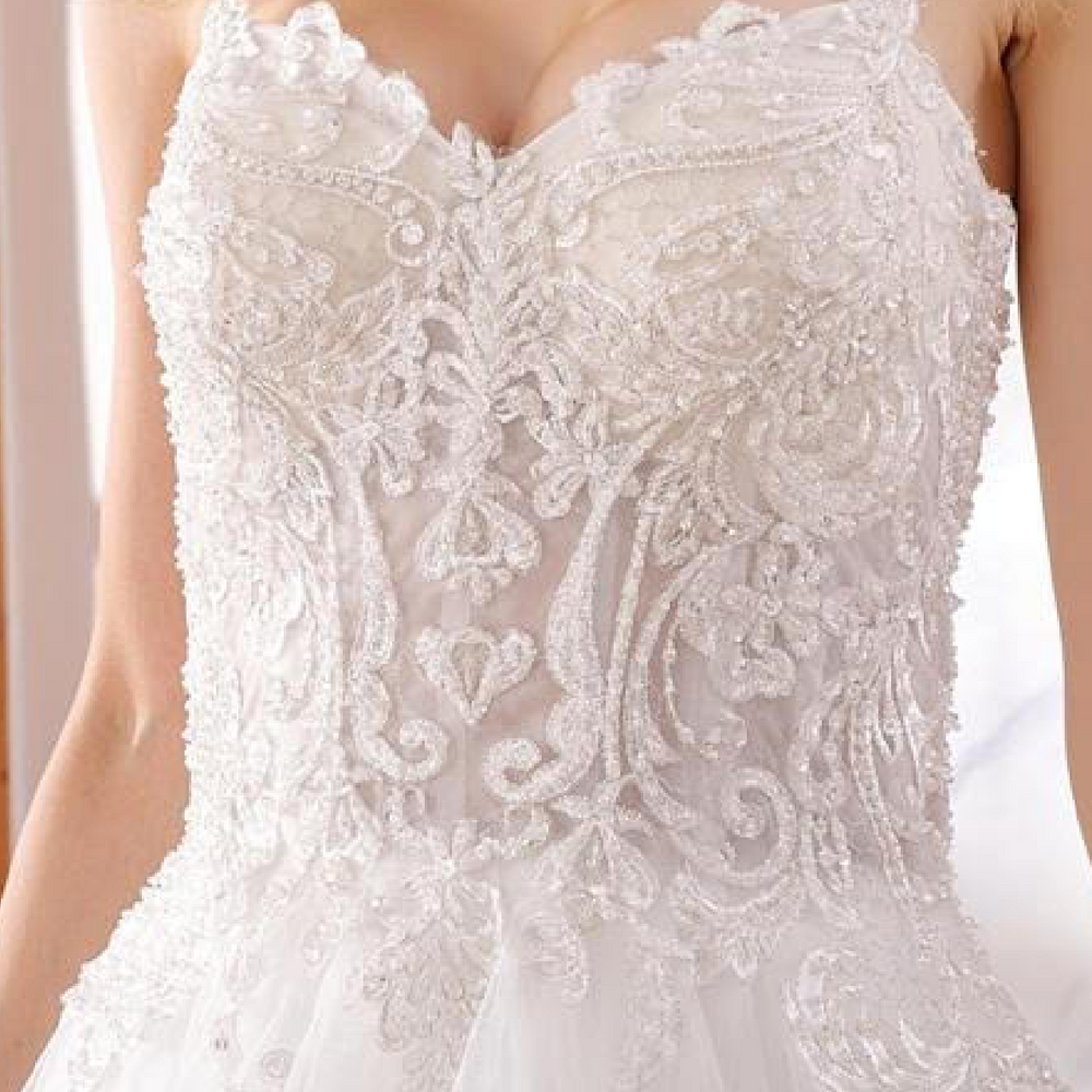 
                      
                        Ruffled Beaded Luxury A Line Wedding Gown
                      
                    