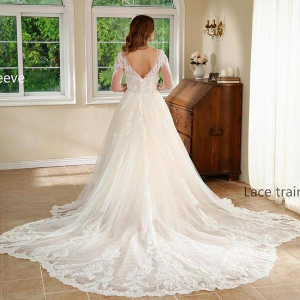 
                      
                        Lace Luxurious Tulle A Line Wedding Gown
                      
                    