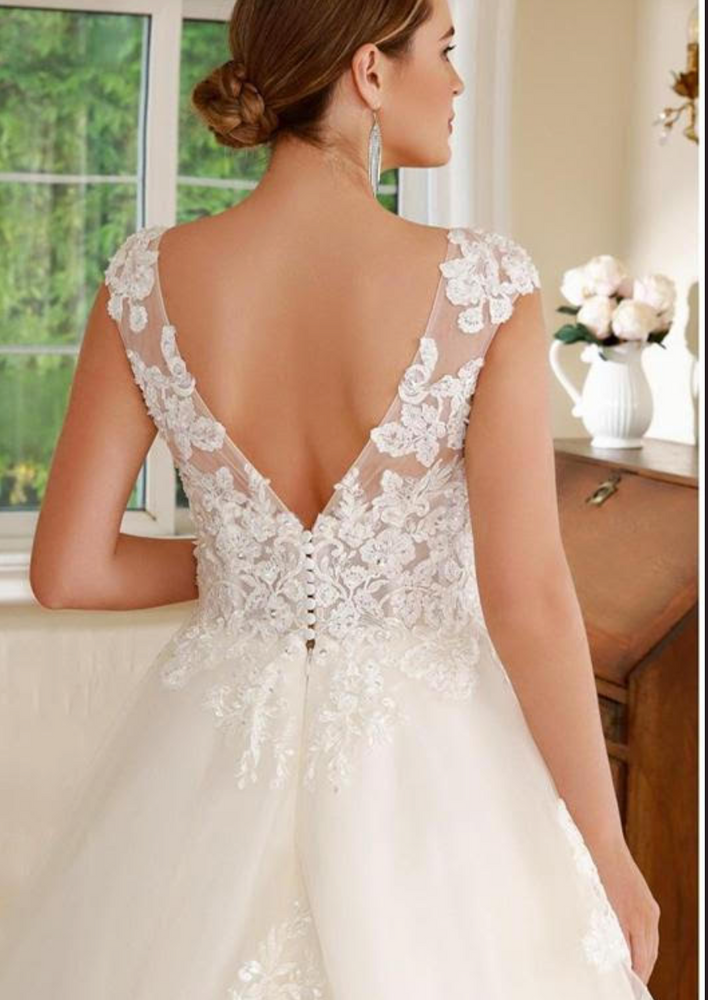 
                      
                        Lace Embellished A Line Sleeveless Wedding Gown
                      
                    