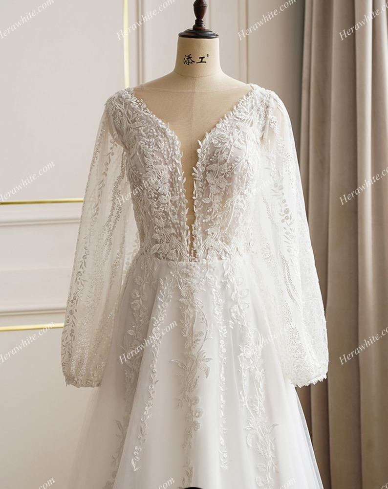 
                      
                        Lace Long Sleeve Plunging Neckline Wedding Dress
                      
                    