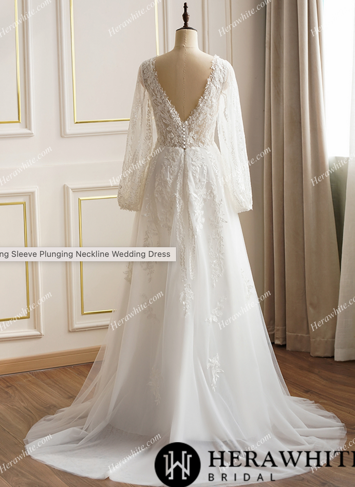 
                      
                        Lace Long Sleeve Plunging Neckline Wedding Dress
                      
                    