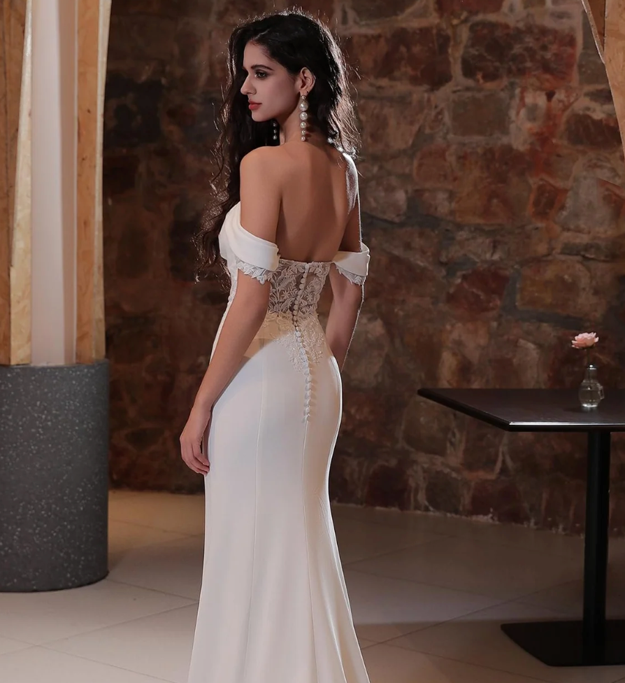 
                      
                        Crepe Wedding Dress with Illusion Style Train
                      
                    