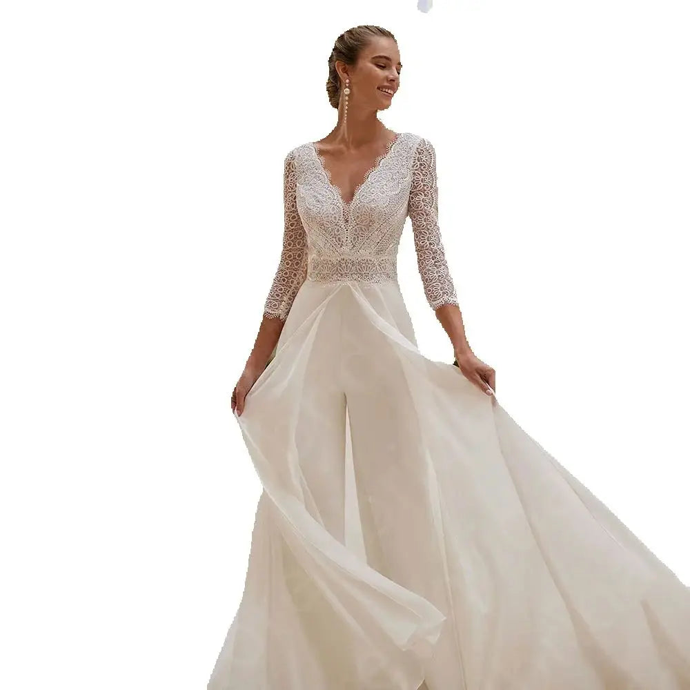 
                      
                        White wedding dress with lace bodice on a white background
                      
                    