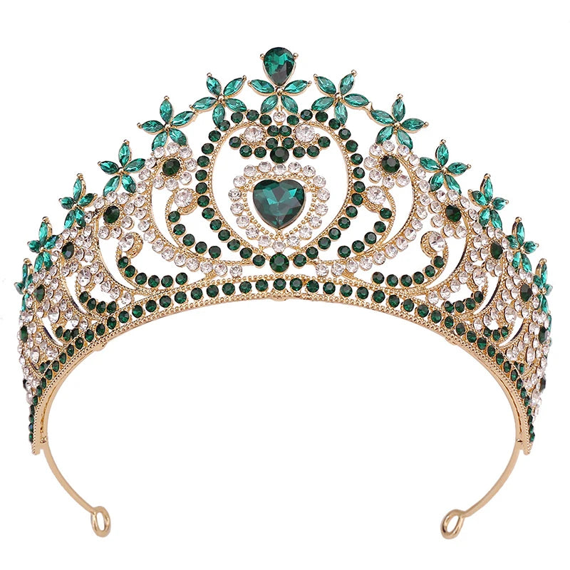 
                      
                        Ornate tiara with green gemstones on a white background
                      
                    