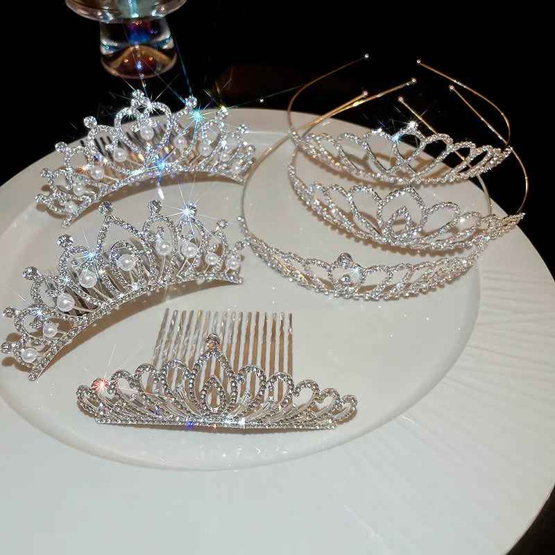 Girls princess tiara crowns in a variety of styles, crystal tiaras on metal frame, pageant, prom, party events.
