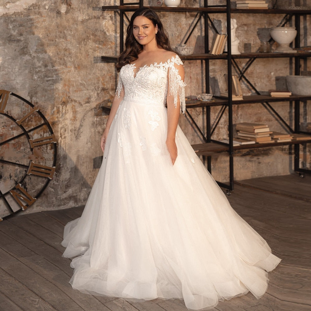 Sheer Neck A-line Bridal Gown Beaded Tassel Cap Sleeve Wedding Dress