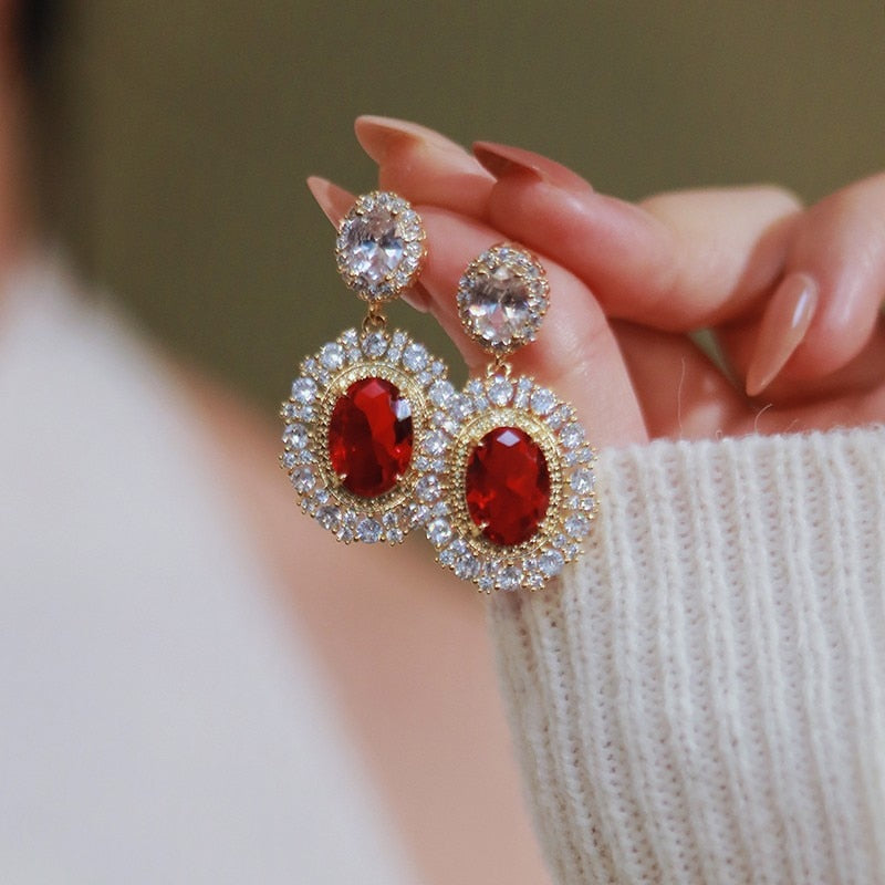 
                      
                        Unique Oval Red Cubic Zirconia Drop Earrings  Gold Color Statement Jewelry Accessory
                      
                    