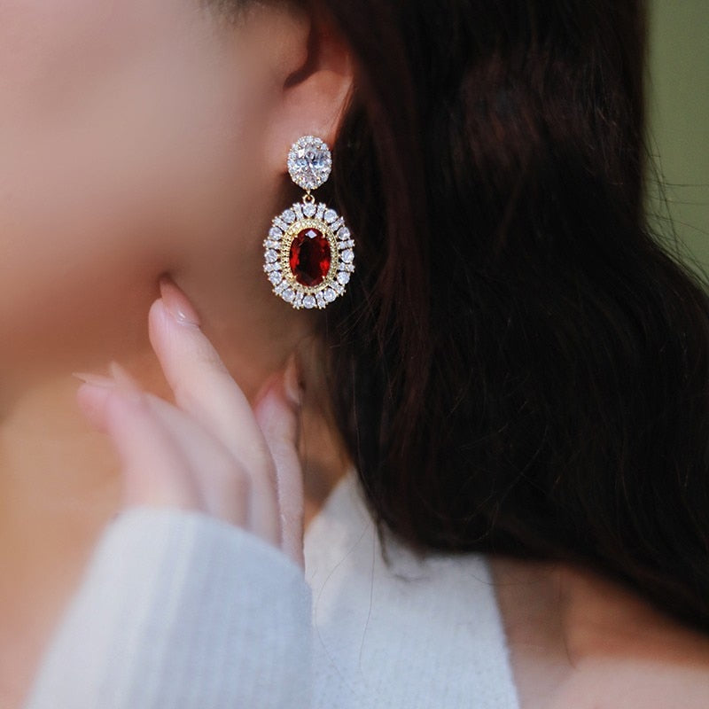 
                      
                        Unique Oval Red Cubic Zirconia Drop Earrings  Gold Color Statement Jewelry Accessory
                      
                    