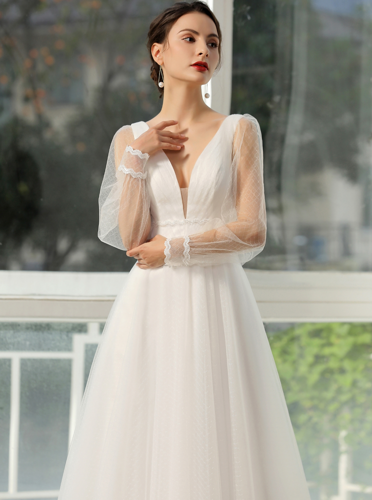 
                      
                        Bishop Long Sleeve Ruched Illusion V-Neckline Bridal Gown
                      
                    
