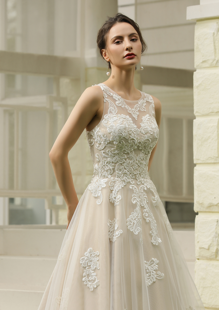 
                      
                        Illusion Halter Neckline Ball Gown Wedding Dress
                      
                    