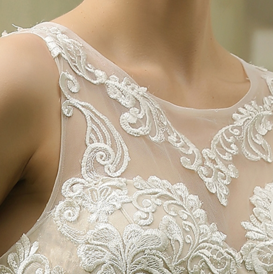 
                      
                        Illusion Halter Neckline Ball Gown Wedding Dress
                      
                    