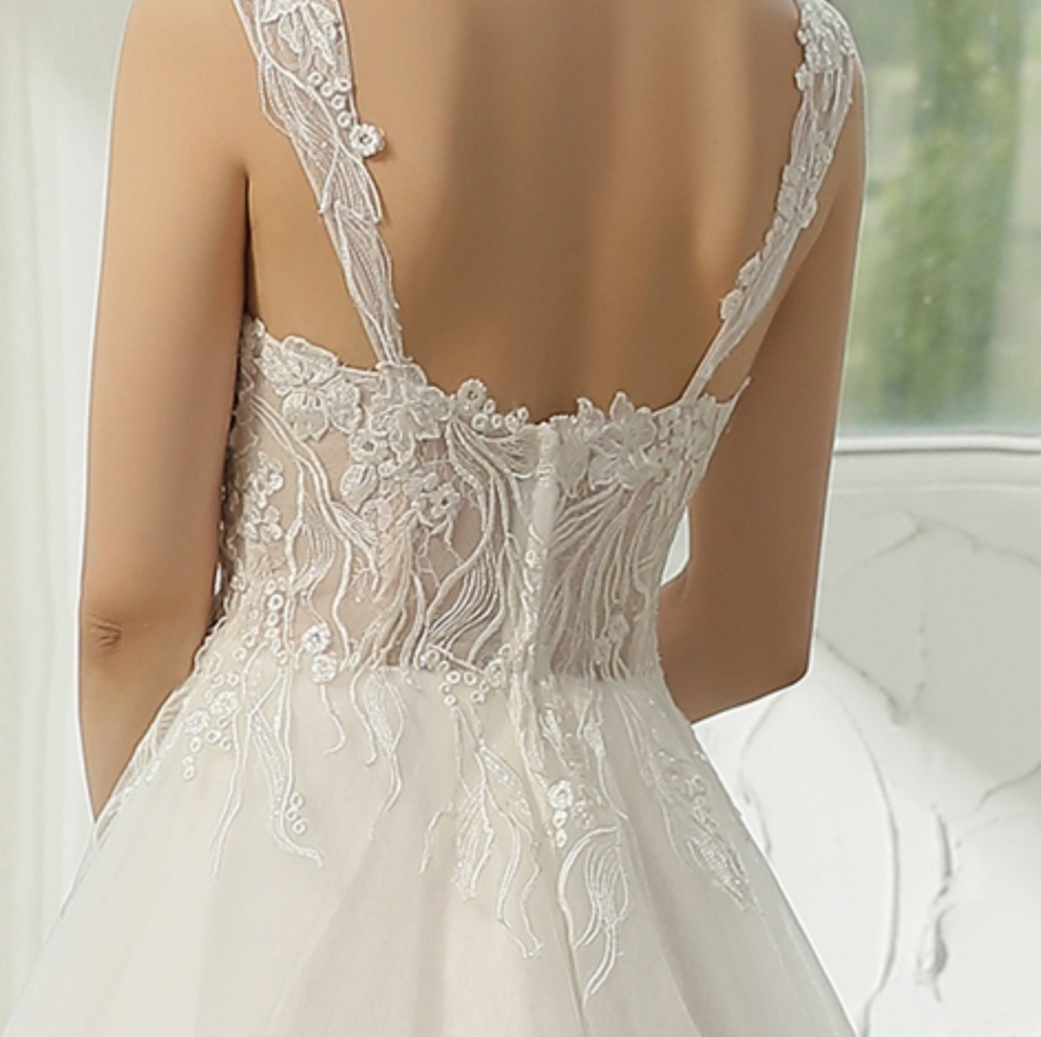 
                      
                        Cap Sleeve Wedding Dress With Glittery Appliqués
                      
                    