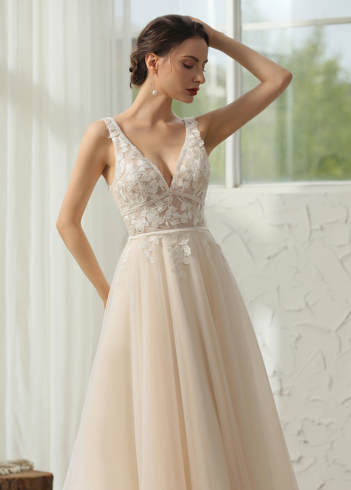 
                      
                        Modern Bohemian Floral Lace Wedding Gown
                      
                    