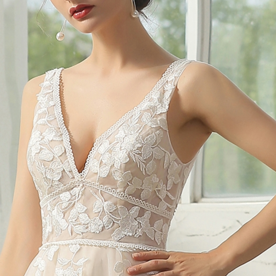 
                      
                        Modern Bohemian Floral Lace Wedding Gown
                      
                    