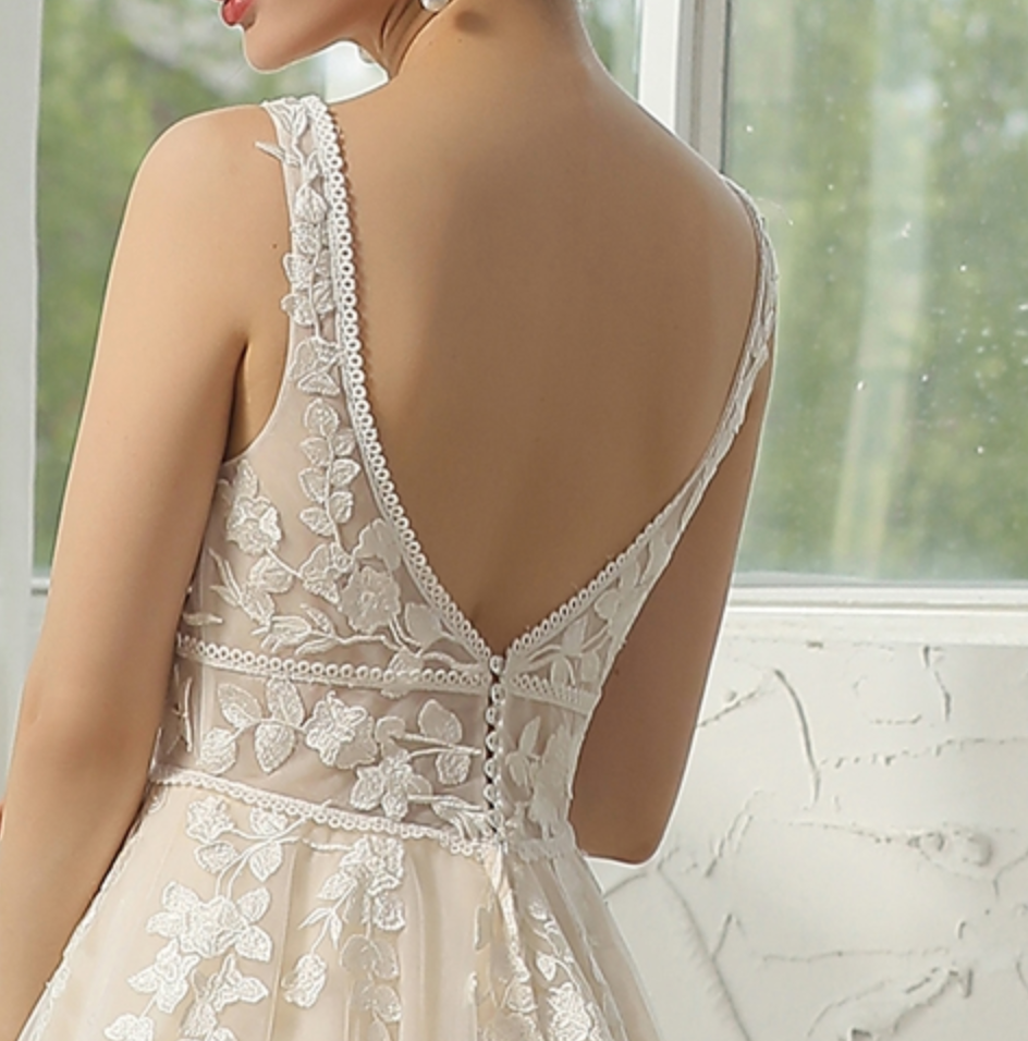 
                      
                        Modern Bohemian Floral Lace Wedding Gown
                      
                    