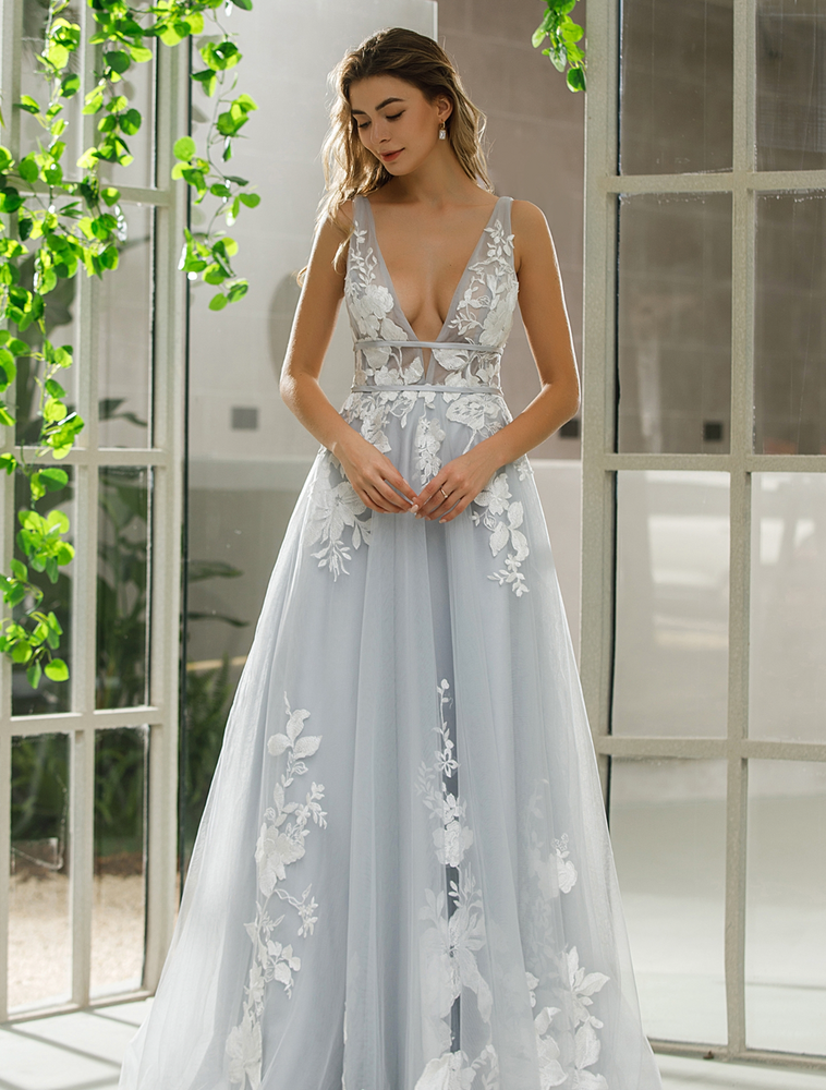
                      
                        Plunging V-Neck Wedding Dress With Floral Motifs
                      
                    