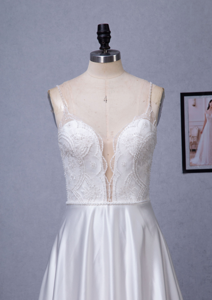 
                      
                        Beaded Deep V-Neckline Satin A-Line Pocket Wedding Dress
                      
                    