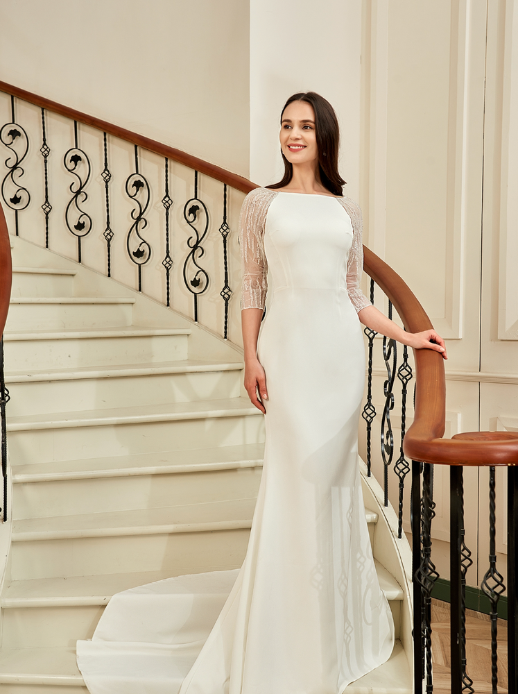 
                      
                        Bateau Neckline Long Train Crepe Bridal Gown With Beaded Illusion Back
                      
                    
