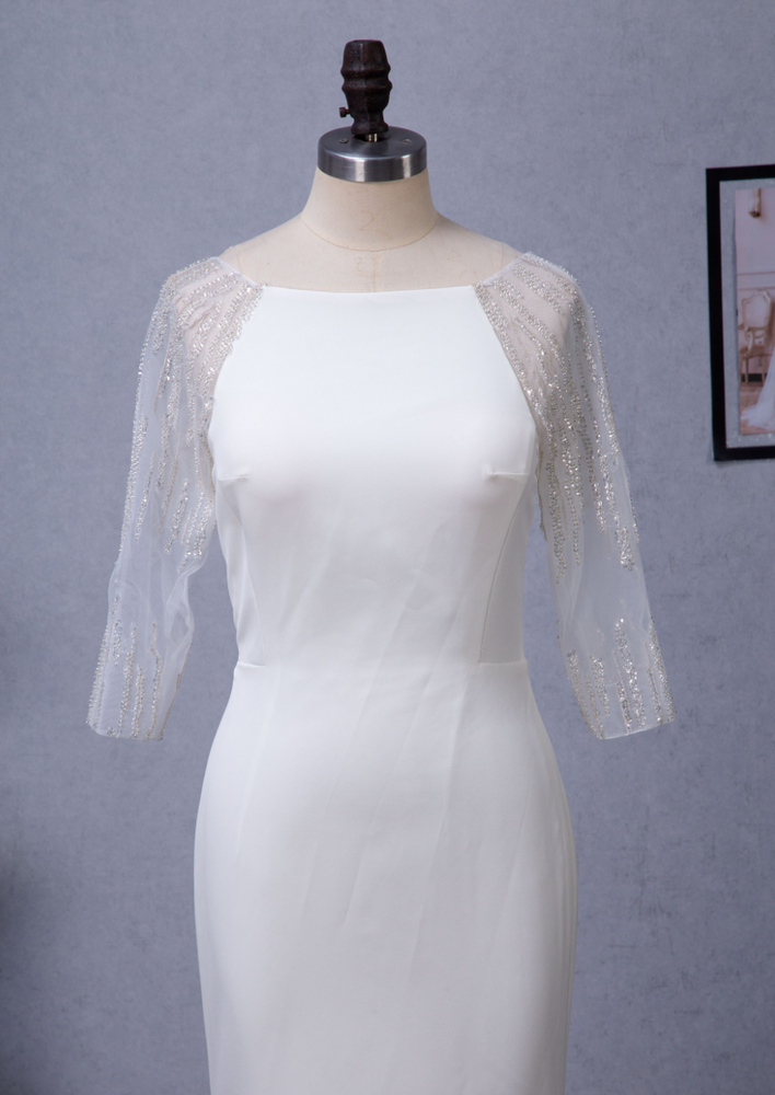 
                      
                        Bateau Neckline Long Train Crepe Bridal Gown With Beaded Illusion Back
                      
                    